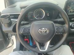 Toyota Corolla Hybrid 1.8H E-CVT Sport - ფოტო 11