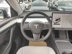 Tesla Model Y Standard Range RWD - ფოტო 11