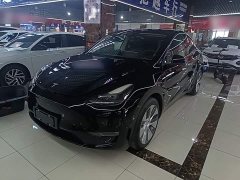 Tesla Model Y Standard Range RWD - ფოტო 1