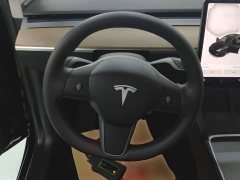Tesla Model Y Standard Range RWD - ფოტო 11