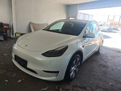 Tesla Model Y Rear-Wheel Drive - ფოტო 1