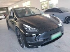 Tesla Model Y Standard Range RWD - ფოტო 4