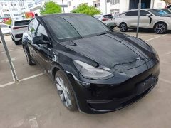 Tesla Model Y Standard Range RWD - ფოტო 4