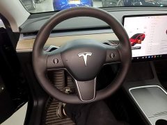 Tesla Model Y Standard Range RWD - ფოტო 11