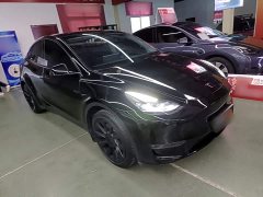 Tesla Model Y Standard Range RWD - ფოტო 4