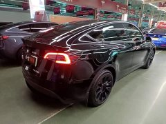 Tesla Model Y Standard Range RWD - ფოტო 7