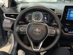 Toyota Corolla Hybrid 1.8H E-CVT Luxury - ფოტო 11
