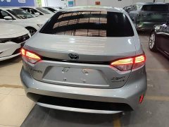 Toyota Corolla Hybrid 1.8H E-CVT Luxury - ფოტო 6