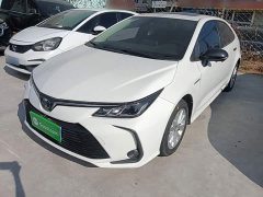 Toyota Corolla Hybrid 1.8L E-CVT Elite - ფოტო 1