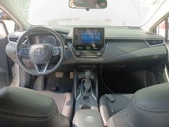 Toyota Corolla Hybrid 1.8L E-CVT Elite - ფოტო 10