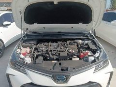 Toyota Corolla Hybrid 1.8L E-CVT Elite - ფოტო 20