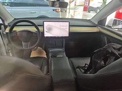 Tesla Model Y Standard Range RWD - ფოტო 10