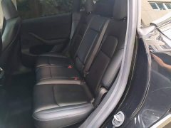 Tesla Model Y Rear-Wheel Drive - ფოტო 17