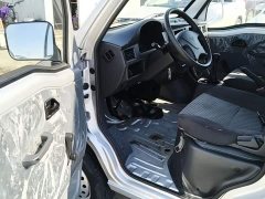Wuling Zhiguang 1.5L Practical 5/7-seater - ფოტო 12