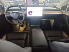 Tesla Model Y Standard Range RWD - ფოტო 10