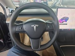 Tesla Model Y Standard Range RWD - ფოტო 11
