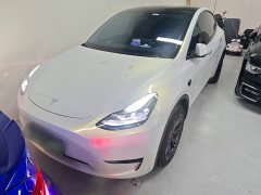 Tesla Model Y Rear-Wheel Drive - ფოტო 1