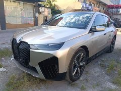 BMW iX xDrive50 - ფოტო 1