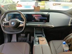 BMW iX xDrive50 - ფოტო 10