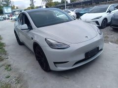 Tesla Model Y Rear-Wheel Drive - ფოტო 4
