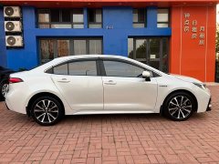 Toyota Corolla Hybrid 1.8H E-CVT Sport - ფოტო 8