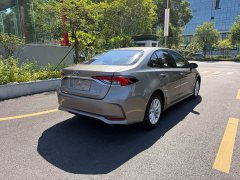 Toyota Corolla Hybrid 1.8L E-CVT Elite - ფოტო 7