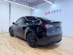 Tesla Model Y Rear-Wheel Drive - ფოტო 4