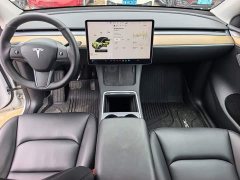 Tesla Model Y Standard Range RWD - ფოტო 11