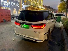 Honda Odyssey 2.0L e:HEV Luxury - ფოტო 4