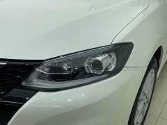 Nissan Qida Tiida 1.6L CVT Smart Edition - ფოტო 4