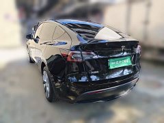 Tesla Model Y Standard Range RWD - ფოტო 4