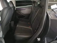 Tesla Model Y Rear-Wheel Drive - ფოტო 17