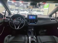 Toyota Corolla Hybrid 1.8H E-CVT Luxury - ფოტო 10