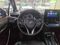 Toyota Corolla Hybrid 1.8H E-CVT Luxury - ფოტო 11