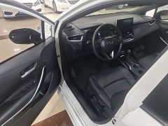 Toyota Corolla Hybrid 1.8H E-CVT Luxury - ფოტო 16