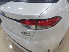 Toyota Corolla Hybrid 1.8H E-CVT Luxury - ფოტო 8