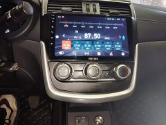 Nissan TIIDA 1.6L Edition - ფოტო 13