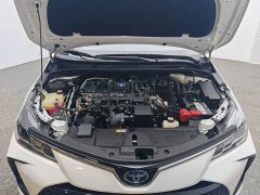 Toyota Corolla Hybrid 1.8L E-CVT Elite - ფოტო 13