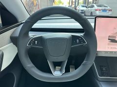 Tesla Model Y Rear-Wheel Drive - ფოტო 12