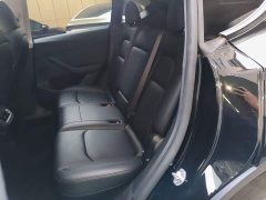 Tesla Model Y Rear-Wheel Drive - ფოტო 17