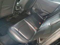Tesla Model Y Rear-Wheel Drive - ფოტო 17