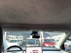 Tesla Model Y Rear-Wheel Drive - ფოტო 18