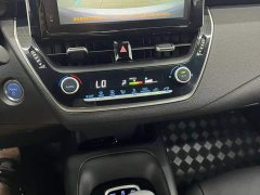 Toyota Corolla Hybrid 1.8H E-CVT Luxury - ფოტო 12
