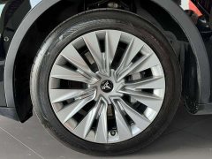 Tesla Model Y Rear-Wheel Drive - ფოტო 16