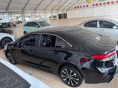 Toyota Corolla Hybrid 1.8H E-CVT Sport - ფოტო 15