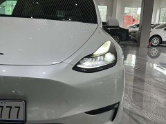Tesla Model Y Rear-Wheel Drive - ფოტო 17