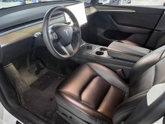 Tesla Model Y Standard Range RWD - ფოტო 4
