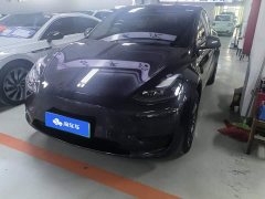 Tesla Model Y Rear-Wheel Drive - ფოტო 1