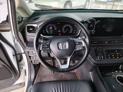 Honda Odyssey 2.0L e:HEV Sharp Premium Edition - ფოტო 10