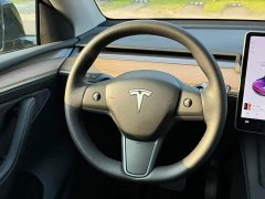 Tesla Model Y Standard Range RWD - ფოტო 11